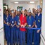 Theatre staff working in the new Daycase Surgical Unit cut the ribbon to declare the new facility open