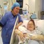 Mother Gemma Gilboy holding baby Nay Kaleb Gilboy with friend and birthing partner Michaela Taylor