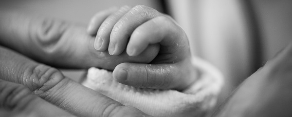 Mother and baby hands
