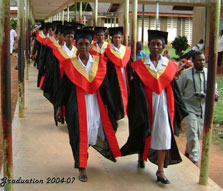 Students in gowns graduating in Muheza